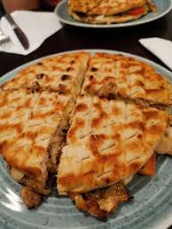 Skepasti Covered Chicken Gyros With Veg Sauce And Cheese Picture Of Simply Greek Edinburgh Tripadvisor