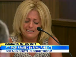 PTA volunteer openly weeps during retrial of rival parent who allegedly  planted drugs in her car
