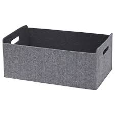 Bord replié avec pompons textiles en haut. Besta Boite Gris Ikea