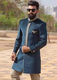 10 Traditional Jodhpuri Sherwani Designs For Modern Touch Wine colour sherwani with finest zari and zardozi work which gives you this sherwani is awesome choice for wedding day which is the most important day of every mens life. traditional jodhpuri sherwani designs