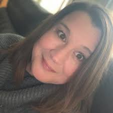 Grad cake with edible books and paper.