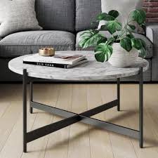 One way to squeeze something into the center of the living area would be to use two small side tables in. Round Coffee Tables Accent Tables The Home Depot