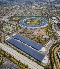 A Green Apple Apple S New Headquarters In Cupertino Is Not Only The Largest Leed Platinum Certified Office Building In No Apple Park Aerial Apple Store Design