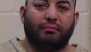 Man charged with choking mother