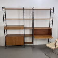 Check out our modular shelving selection for the very best in unique or custom, handmade pieces from our home & living shops. British Teak Metal Ladderax Modular Shelving Unit By Robert Heals For Staples 1960s For Sale At Pamono