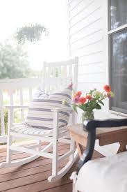 White Rocking Chair With Blue Striped Pillow On Porch Rocking Chair Porch White Rocking Chairs Rocking Chair