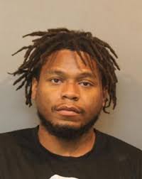 Man charged with breaking into gun shop, leading police