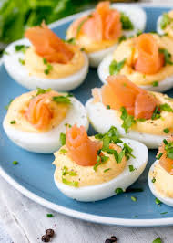 Ham studded with cloves on a serving platter. 20 Quick And Easy Easter Brunch Recipes Brit Co