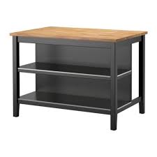 With shelves beneath the tabletop, you'll be able to hide much of your storage: Why This Kitchen Island Is My Favorite Thing In My Apartment Kitchn