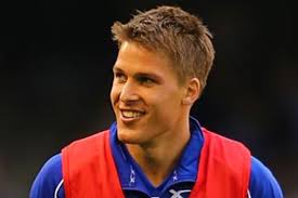 North Melbourne's Brad Scott urges caution