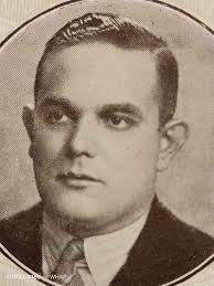 Joseph Carter cobbler in doorway of his shop in Church Street. 1951