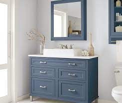 And while we've seen the hue take shape in dramatic navy dining rooms and beachy baby blue bedrooms, the color lends itself particularly well to the heart of the home. Blue Bathroom Inset Cabinets Decora Cabinetry