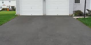 Driveway repair, putting a bag of blacktop asphalt on a. 3 Driveway Options Asphalt Interlock Paving Stones