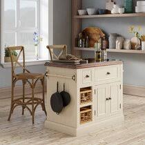 Stylish design features include a solid hardwood, distressed oak finished top with profiled edges and a black granite inset; Granite Kitchen Islands Carts You Ll Love In 2021 Wayfair