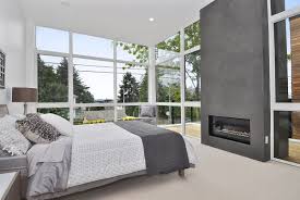 Natural looking hardwood floor with a master bed as a central piece. Master Bedroom Fireplace Houzz