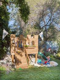 Playhouse fort plans diy 2 story backyard playground kids toys build your own. Building Our Backyard Castle With Wood Naturally Fort Roundup Emily Henderson