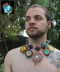 Liza Lou's Kitchen (1991–96) is a life-sized installation entirely covered  in glass beads, turning an ordinary kitchen into a dazzling,  labor-intensive work of art. Created over five years, the piece challenges  traditional