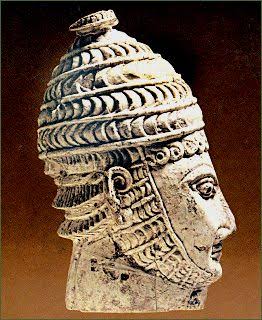 Mycenae, chamber tomb 27. Warrior's head made of ivory. Athens National Archaeological Museum 2468. Hellenic Ministry of Culture/ARF. Demakopoulou, K. (ed.), O Mykinaikos Kosmos. Pente Aiones Proimou Ellinikou Politismou 1600-1100 BC., Hellenic