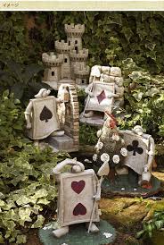 Pin By Lisa Milbrodt On Alice In Wonderland Story Disney Garden Alice In Wonderland Room Alice In Wonderland Crafts