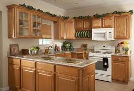 oak cabinets and white appliances