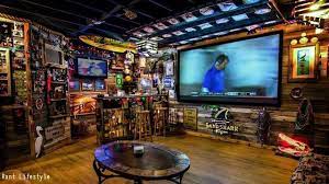 10 Must Have Items For The Ultimate Man Cave Best Man Caves Ultimate Man Cave Man Cave Garage