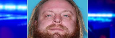 5 arrested in connection with Portland shooting death, another suspect  sought