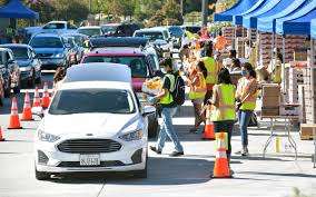 Free food giveawaywe help feed our starving communities. Drive Thru Food Distribution Draws Long Line Plenty Of Gratitude