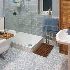 Grey floor tiles grey floor tiles add a contemporary touch wherever they're placed. Chiara S Calming Bathroom Makeover Ledbury Pattern Tiles Patterned Bathroom Tiles Blue Bathroom Tile Patterned Floor Tiles
