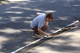 Curb ramps can be attached in place and are removable for street cleaning. A Buyer S Guide To Rubber Ramps For Rolled Curb Driveway Entries Bridjit Curb Ramps