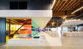 Color Changing Glass Bathes The Interior Of The New Canvas Worldwide Headquarters In Vibrant Light Advertising Agency Interior Commercial Design Office Floor Plan