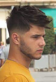 Laid Spikes Most Of The Haircuts We Ve Shown So Far Have Featured Spikes That Bend Upward But These Spikes Are Style Spiky Hair Fade Haircut Mens Hairstyles