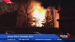 Calgary firefighters battle Douglas Glen house fire