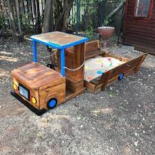 Fun Filled Sandbox With Loads Of Activities Sandbox Size 1 2m X 1 2m Sandbox Lid Doubles Up A Seat Entire Kids Backyard Playground Kids Sandbox Diy Playground