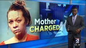 Mother charged in death of baby son