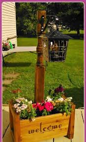 15 Awesome Lighted Planter Ideas To Make Your Garden Glowing And Romantic In 2020 With Images Wooden Garden Planters Front Yard Landscaping Design Wooden Garden