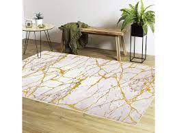 Améliorez votre salle de bains avec cette conception moderne unique. Tapis Effet Marbre Dore Dimensions 200 X 290 Cm Couleur Or Vente De Tapis Salon Et Chambre Conforama
