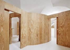 From that mark, drop a plumb bob and mark the floor. Curving Pine Plywood Partition Sets Off A Vaulted Interior In Barcelona Eastern White Pine