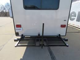 You can adjust the distances between the two shelves. Lippert Components Flip Down Slotted Bike Rack Tailgate Storage System Lippert Rv And Camper Bike Ra Storage System Bike Rack Cargo Rack