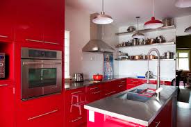 kitchen pantry with red cabinets