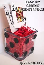 This diy casino theme centerpiece, and decorations are going to look amazing at your casino theme party. Easy Diy Casino Centerpiece For A Poker Party Life And The Little Details Casino Party Decorations Casino Theme Parties Casino Centerpieces