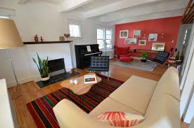 Adding glass and metallic features sharpens up the white pieces. Red And Black Living Room Ideas Photos Houzz