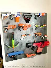 Here are some other solutions that don't require any pegs. Diy Nerf Gun Storage Rack The Handyman S Daughter