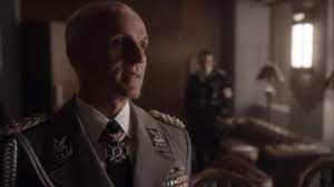 Several characters in the man in the high castle read the popular novel the grasshopper lies heavy, by hawthorne abendsen, whose title is can you imagine getting into reinhard heydrich's face?22. The Man In The High Castle John Smith And Reinhard Heydrich Youtube