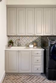 Transitional Laundry With Herringbone Brick Paver Floor Benjamin Moore River Reflections Cabinets And Pa Lake House Kitchen Laundry Room Remodel Brick Kitchen