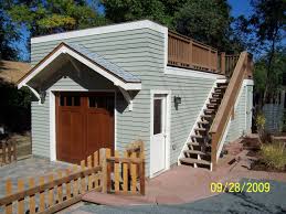 The cost of repairing a garage roof or replacing a garage roof is not cheap. Deck Above Garage Houzz