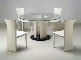 Discover round shape dining table featuring a stylishly varied range of different colours, materials and finishes. Sleek Round Glass Dining Tables That Make A Stylish Impression Modern Dining Tables Glass Round Dining Table Modern Round Dining Room Table Glass Dining Room Table