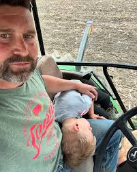 30 minute cat nap and Grants back! Tuxedo American bow tie shirt!