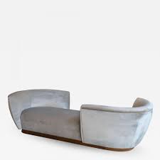 This octagon shape sofa measures 70x70x42h and can be made in your choice of fabric (swatches sent upon request). Adesso Studio Custom Tete A Tete Sofa Bench In Grey Velvet With Walnut Base By Adesso Imports