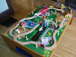 Hape e3766 70 piece railway train table and set toy with battery powered locomotive with removable playmat surface and storage for kids 3 years and up. The 7 Best Train Sets For Kids In 2021