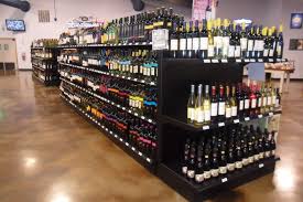 Handy Store Fixtures Black Liquor Store Shelving In 2020 Liquor Store Wine Bottle Display Wine Store